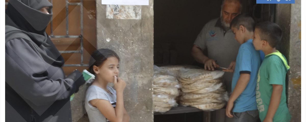 توزيع الخبز في حلب برنامج الأمن الغذائي