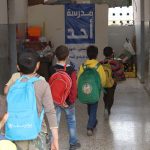 student entering the school