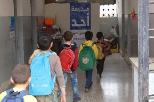 student entering the school